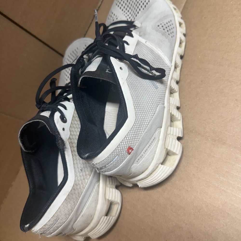 On Running Black and White Sneakers